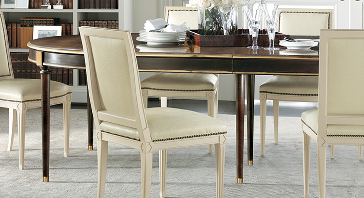 Dining chairs around a table that shows optional striping