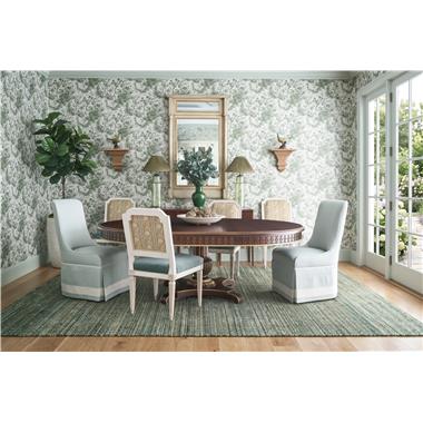 Room Scene: HC5341-70/HC5342-70 Gustav Dining Table shown in Truffle finish with optional solid gold striping; HC6708-02 Kathryn Dining Chair shown in PE6539-52 fabric on seat and HC810-27-LIBERTY fabric on inside and outside back and Heritage White finish; HC6706-02 Evelyn Kick Pleat Dining Chair shown in Hc4029-32 fabric with HC2393-10 welt and GB-58854/04 Veranda Linen Crete tape on base of skirt and HC6491-70 Alexis Console shown in Oxford finish.