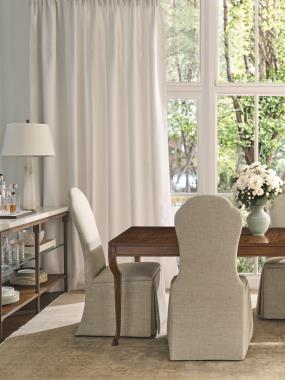 Room Scene: HC739-70 Hoof Dining table shown in Chestnut finish; HC710-02 Lemont Side Chair shown in HC301-30 fabric and HC299-70 Huxley Console/Bar shown in Chestnut finish.