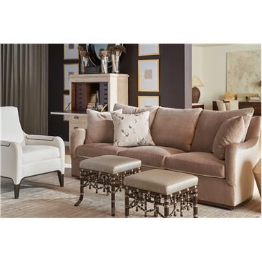 HC9509-S2 Jules Configurable Sofa with AR3 Saddle Arm, B5 Wood Trim Base shown in Truffle finish and HC297-13 fabric; HC9507-24 Giles Chair shown in Ebony finish with HC365-10 fabric; 
 HC5374-70/ HC5375-70 Alice Deck and Chest shown in Alabaster finish; HC6318-88 Faux Bamboo Bench shown in optional Espresso and Antique Rub Light Gold Striping finish and HC3087-70 Brooks Spot Table shown in Patina finish.