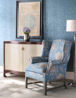 Room Scene: HC1857-55 Chippendale Wing Chair shown in HC809-93-LIBERTY fabric with 
Antique Nickel - Petite nail trim and Slate finish, HC9000-70 Sula Serpentine Chest shown in Truffle finish.