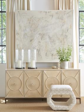 HC4600-C2 Textures Four Door Credenza shown in optional Alabaster paint and with
F4 Circle Door; MSB Metal Saber Leg Base- Overall height 32"; AG3 Antique Silver
Ring Pull, P1 Centered Hardware Placement and HC8521-29 Soraya Ottoman shown in
optional Hable Grey finish and in fabric HC377-13.