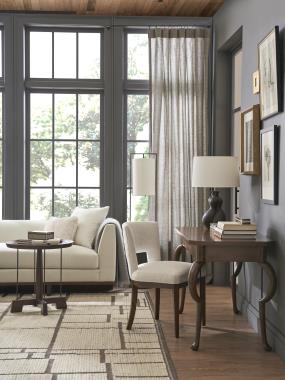 Room Scene:  HC7248-10 Adele Desk shown in standard Truffle finish, HC7227-90 Boden Sofa shown in optional Java finish and in fabric HC328-10, HC399-14 Finback Side Chair
shown in optional Java finish and in fabric HC311-10 and HC7383-10 Tilda
Side Table shown in standard Truffle finish.